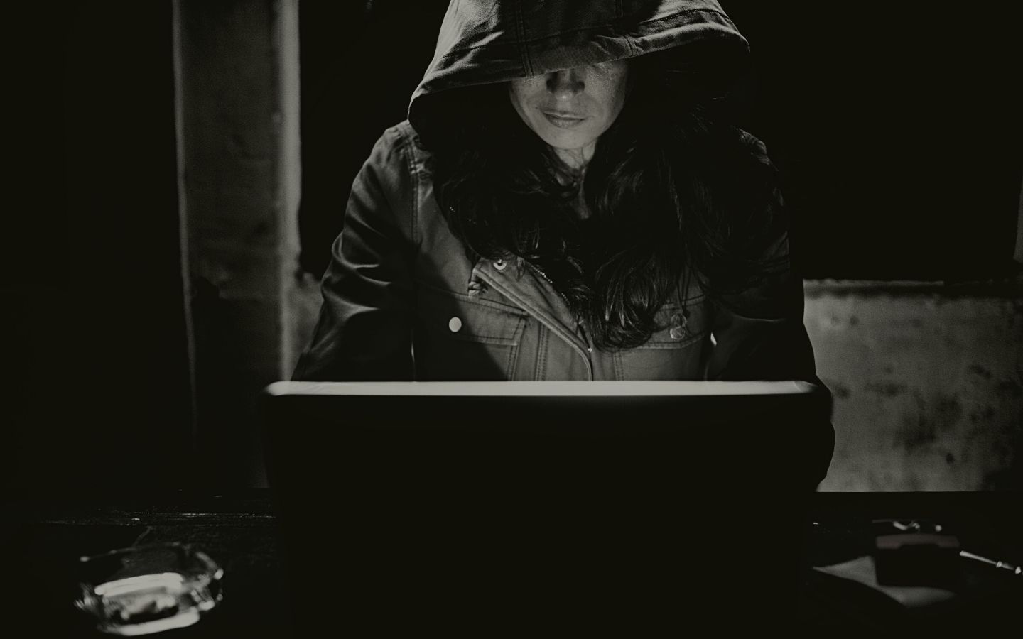 cyber scammer woman hacking computer
